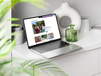 Nachrichtenbereich der Diakonie-Allgäu-Website auf einem Laptop